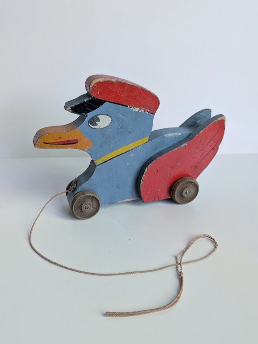 Vintage Painted Wooden Pull Along Duck Toy on Wheels